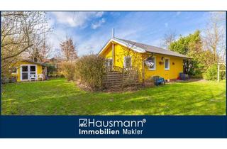 Haus kaufen in Dorfkoppel, 23813 Nehms, Charmantes Ferienhaus mit Kamin und großem Garten unmittelbar am Nehmser See!