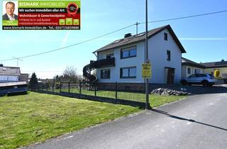Einfamilienhaus kaufen in 56825 Urschmitt, Freistehendes Einfamilienhaus mit großer Garage und sehr schönem Garten.