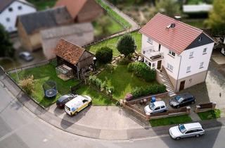 Einfamilienhaus kaufen in 63584 Gründau, Charmantes Einfamilienhaus mit Baureserve – ruhig & großzügig