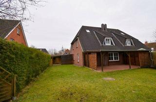 Doppelhaushälfte kaufen in 24783 Osterrönfeld, Charmante Doppelhaushälfte in Osterrönfeld