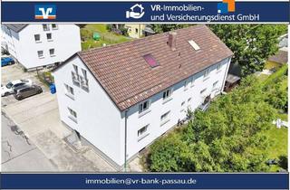 Wohnung kaufen in 94060 Pocking, Stilvolle Kapitalanlage mit Charme – vermietete 2-Zimmer-Wohnung mit kleinem Gartenanteil und Stellp