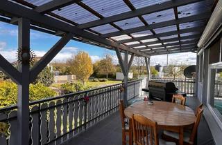 Wohnung kaufen in 76709 Kronau, Neuwertige 3ZKB mit Garage, Stellplatz, großem Balkon und Garten