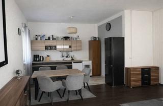 Wohnung kaufen in 97353 Wiesentheid, Attraktive 4-Zimmer-Erdgeschosswohnung mit Garten und Stellplatz