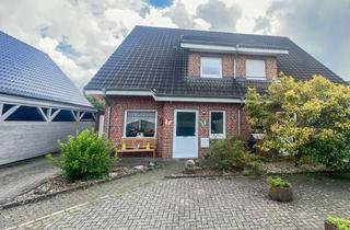 Doppelhaushälfte kaufen in 48599 Gronau, Kapitalanlage: Vermietete Doppelhaushälfte mit Garten in guter Lage