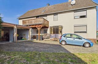 Haus kaufen in 31195 Lamspringe, Handwerkerobjekt mit drei Garagen und Balkon – mit Raum für neue Ideen