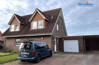 Doppelhaushälfte kaufen in 26427 Stedesdorf, Doppelhaushälfte mit rückwärtig unverbautem Blick
