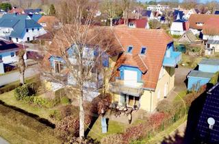 Wohnung kaufen in 18374 Zingst, Helle Erdgeschosswohnung mit 2 Schlafzimmern, sonniger Terrasse und eigenem Garten.