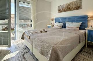 Wohnung kaufen in 18374 Zingst, Zingst: Für Kapitalanleger - sehr gut vermietete Erdgeschosswohnung mit eigenem Garten.