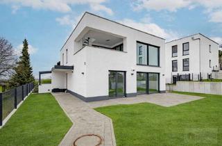 Haus kaufen in 79415 Bad Bellingen, Ein Statement aus Raum und Licht.