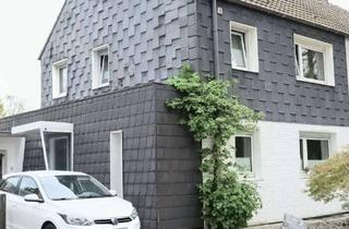 Doppelhaushälfte kaufen in 46049 Lirich-Nord, Familienfreundliche Doppelhaushälfte mit Kamin, Traumgarten in Oberhausen-Lirich-Nord