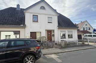 Doppelhaushälfte kaufen in 28779 Bremen, Doppelhaushälfte mit Wintergarten, Garage und viel Gestaltungspotenzial in Bremen-Blumenthal