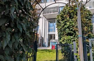 Wohnung kaufen in 68259 Wallstadt, Stadthaus-Feeling pur: Lichtdurchflutete Garten-Maisonette in Mannheims grüner Oase