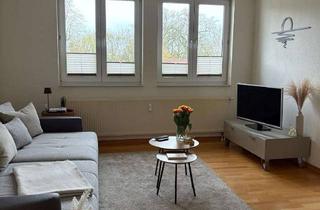 Wohnung kaufen in 31582 Nienburg, Attraktive 2,5-Zimmer-Eigentumswohnung im 2. Obergeschoss in zentraler Lage mit Balkon und Parkblick