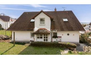 Mehrfamilienhaus kaufen in 63628 Bad Soden-Salmünster, Teilvermietetes Mehrfamilienhaus mit 4 Einheiten, Balkonen, Terrasse und Stellplätzen