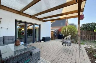 Doppelhaushälfte kaufen in 49201 Dissen, Modernes Familienzuhause mit großem Garten und überdachter Terrasse