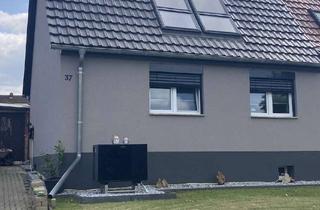 Doppelhaushälfte kaufen in 06295 Lutherstadt Eisleben, KfW E-Effizienz A+, Wärmepumpe, Dämmung, Solar, Wallbox, teilsaniert DHH Doppelhaushälfte