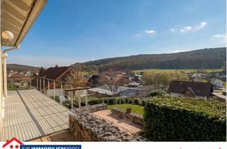 Haus kaufen in 35075 Gladenbach, Modernes Wohnen mit Talblick, Einliegerwohnung und mediterranem Flair im OT Gladenbach