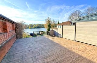 Reihenhaus kaufen in 23923 Schönberg, Endreihenhaus mit Oberteichblick – 42 m² Terrasse und Stellplatz in zentraler Lage