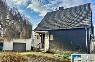 Einfamilienhaus kaufen in 57587 Birken-Honigsessen, Kompaktes Einfamilienhaus mit sep. Garagengebäude sowie großzügigem Grundstück