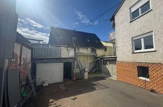 Anlageobjekt in 63695 Glauburg, INVESTMENTPAKET! 8 Wohnungen in 3 sanierungsbedürftigen Gebäuden zu verkaufen!