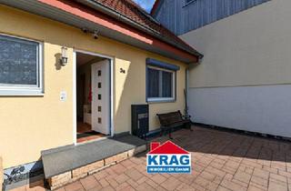 Doppelhaushälfte kaufen in 35096 Weimar, ++ KRAG Immobilien ++ Naturnah wohnen mit Terrasse, Hanggarten, Stellplätzen und Kellerflächen