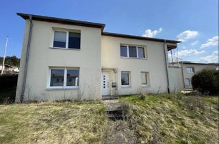 Haus kaufen in 34466 Wolfhagen, Geräumiges Zweifamilienhaus mit zwei Wohneinheiten in Wolfhagen!