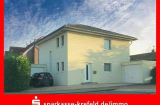 Einfamilienhaus kaufen in 41372 Niederkrüchten, Niederkrüchten - Freistehendes Einfamilienhaus mit zwei Garagen