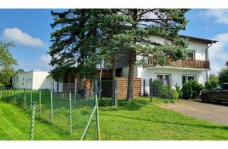 Gewerbeimmobilie kaufen in 53639 Königswinter, Wohnhaus mit großer Lagerhalle. Blick auf das Siebengebirge inklusive!