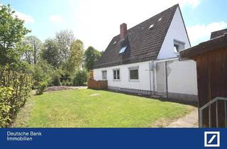 Haus kaufen in 37589 Kalefeld, Kalefeld - Drei Wohnungen und große Lagerhalle mit schönem Garten und Garage!