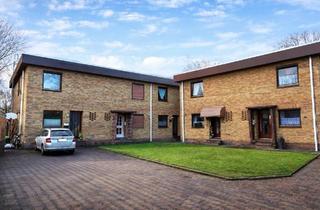Wohnung kaufen in 27474 Cuxhaven, Cuxhaven - Renovierte Eigentumswohnung im Reihenhausstil mit Garten