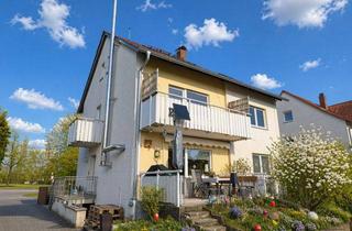 Mehrfamilienhaus kaufen in 91056 Erlangen, Selbst einziehen und Rendite sichern: Mehrfamilienhaus mit laufenden Einnahmen und freier Einheit