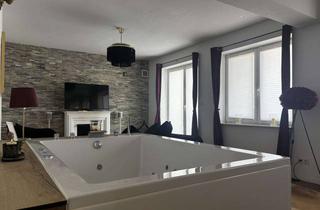 Wohnung kaufen in 28844 Weyhe, Exklusive Kapitalanlage: Wellness-Ferienwohnung mit Whirlpool und Spa-Zugang