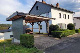 Haus kaufen in Steckenrother Weg, 65329 Hohenstein, Vielseitig nutzbares 8-Zimmer-Haus mit Garagen und einem Baugrundstück in Hohenstein