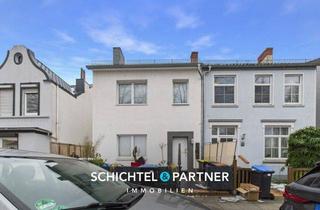 Haus kaufen in 28197 Bremen, Woltmershausen | Modernisiertes Dreiparteienhaus in direkter Deichlage