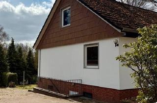 Einfamilienhaus kaufen in 21398 Neetze, Neetze - Haus mit ausgebautem Keller, Garage und großem Südgrundstück