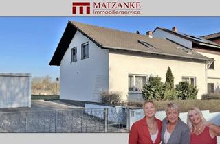 Doppelhaushälfte kaufen in 63694 Limeshain, Himbach: Wohnhaus mit Garten und Garage in Feldrandlage