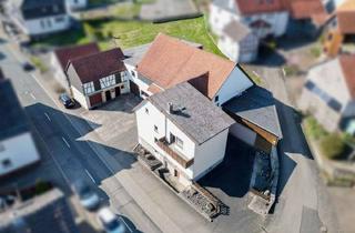 Einfamilienhaus kaufen in 35325 Mücke, Vielseitige Nutzungsmöglichkeiten - Einfamilienhaus mit großzügigen Nebengebäuden