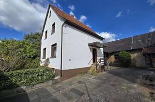 Einfamilienhaus kaufen in 65428 Rüsselsheim, Einfamilienhaus für die kleine Familie mit Scheune sucht neuen Eigentümer