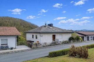 Einfamilienhaus kaufen in 35614 Aßlar, Großzügiges Einfamilienhaus mit Indoor-Pool, Sauna und traumhaftem Bergblick in Hanglage von Aßlar