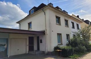 Doppelhaushälfte kaufen in 42579 Heiligenhaus, Familienfreundliche Doppelhaushälfte mit sonnigem Garten, Balkon und Dachterrasse