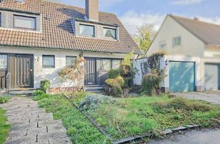 Doppelhaushälfte kaufen in 40670 Meerbusch, Meerbusch-Strümp: Gemütliche Doppelhaushälfte mit Garage und Garten in beliebter Lage