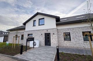 Wohnung kaufen in 25746 Heide, Dachgeschosswohnung mit besonderem Wohngefühl in Heide