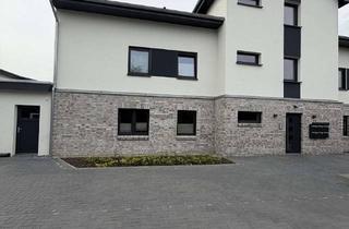 Wohnung kaufen in 25746 Heide, Moderne Erdgeschosswohnung mit Terrasse & Garten