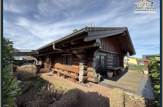 Haus kaufen in 56244 Ettinghausen, Von RTI "Einzigartiges Blockhaus mit Kachelofen und besonderem Wohngefühl in Ettinghausen"