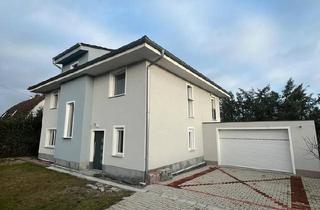 Einfamilienhaus kaufen in 14542 Werder (Havel), Werder (Havel) - Modernes Neubauhaus mit Garten und Doppelgarage