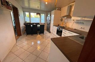 Wohnung kaufen in 71144 Steinenbronn, Steinenbronn - Vermietete 3,5-Zimmer-Erdgeschosswohnung mit Garten & Tiefgarage