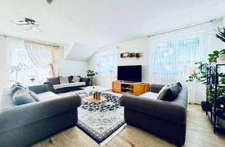 Wohnung kaufen in 65462 Ginsheim-Gustavsburg, Attraktive Dachgeschosswohnung mit großer Terrasse und viel Lichtin Ginsheim-Gustavsburg