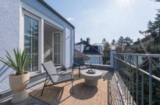 Wohnung kaufen in 65795 Hattersheim, Wohnen am Main: Helle Dachgeschosswohnung mit Panoramabalkon & Kamin