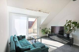 Wohnung kaufen in 71701 Schwieberdingen, Lichtdurchflutete Dachgeschosswohnung mit sonnigem Balkon