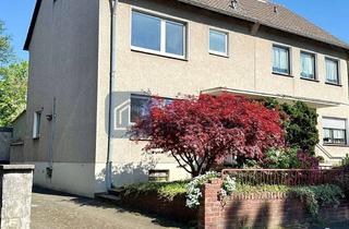 Doppelhaushälfte kaufen in 40764 Langenfeld, Doppelhaushälfte mit großem Garten und eigener Garage im Herzen von Langenfeld